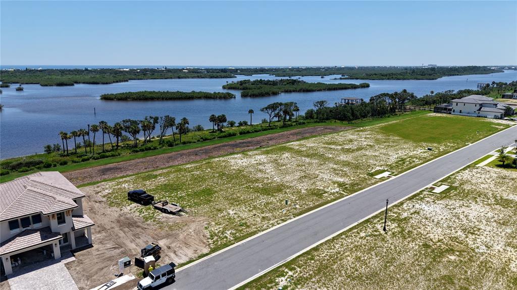 20 Coronado Road Flagler Beach, FL 32136 - Photo 9 of 15 a view of a lake with a outdoor seating