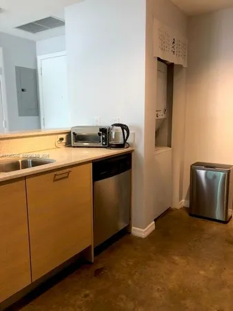 a utility room with washer and dryer