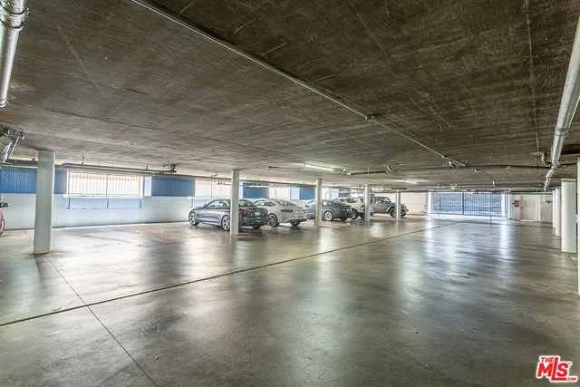 a view of a room with lots of wooden furniture and floors