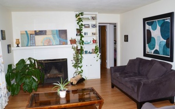 91 Jeffrey Road Springfield, MA 01119 - Photo 16 of 30 a living room with furniture and a fireplace