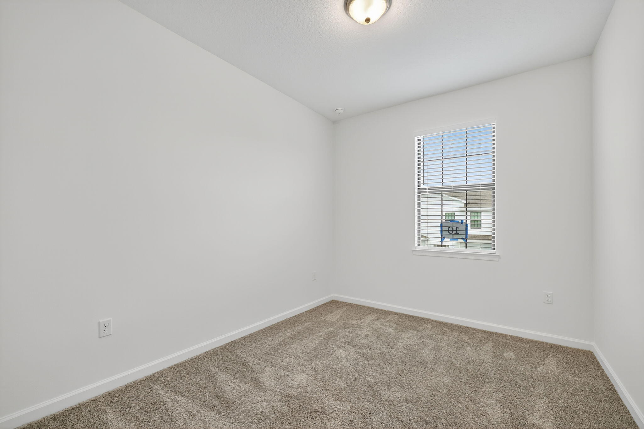 7596 Southwest Linus Lane Stuart, FL 34997 - Photo 13 of 26 an empty room with a window