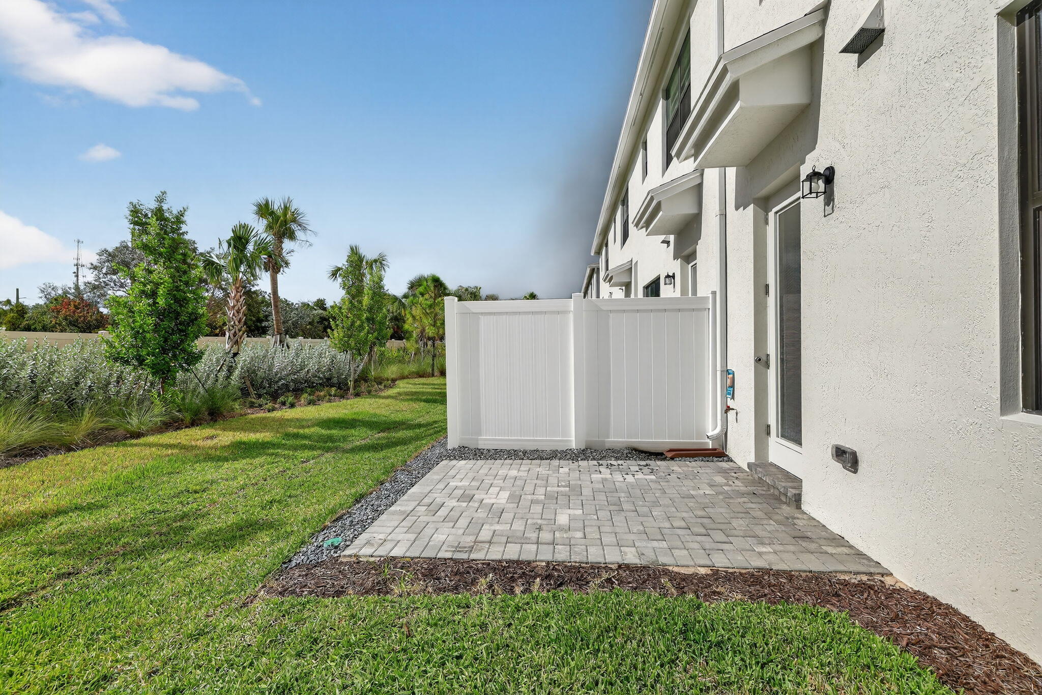 7596 Southwest Linus Lane Stuart, FL 34997 - Photo 21 of 26 a view of a back yard of the house