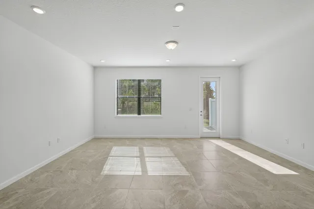 an empty room with windows