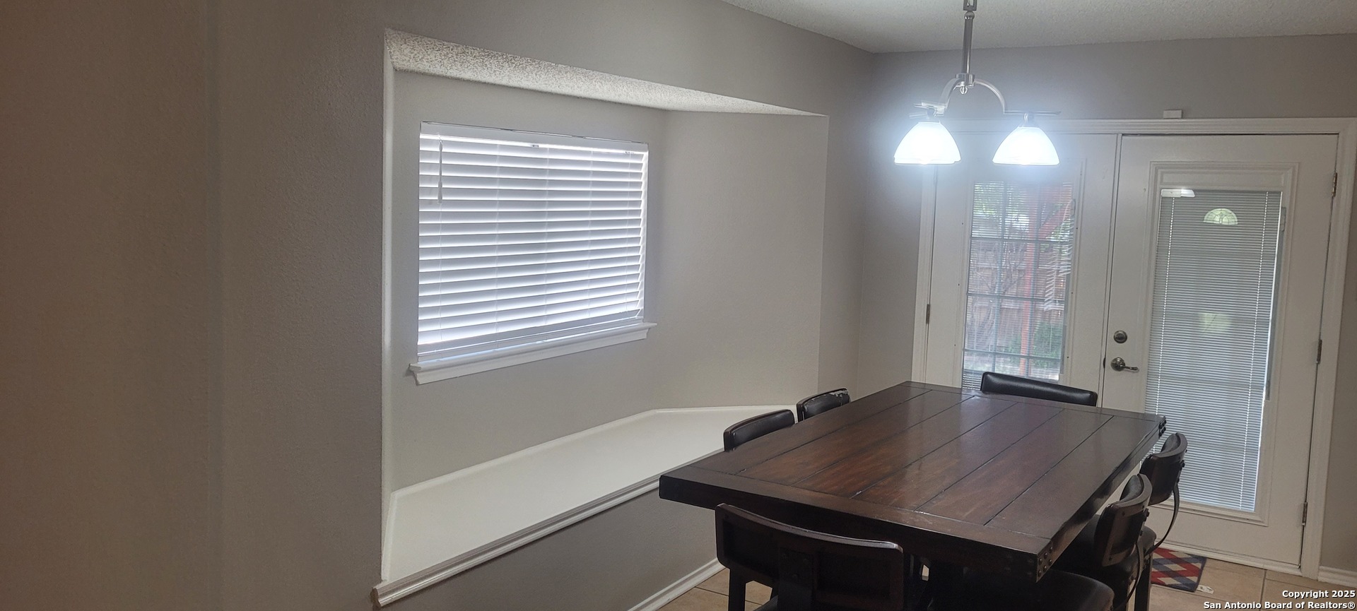7006 Raintree Place San Antonio, TX 78233 - Photo 11 of 19 a view of a workspace with furniture and window