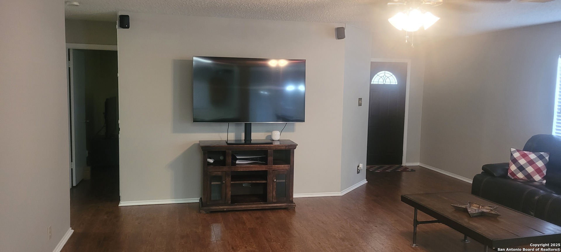 7006 Raintree Place San Antonio, TX 78233 - Photo 8 of 19 a view of livingroom with furniture and wooden floor
