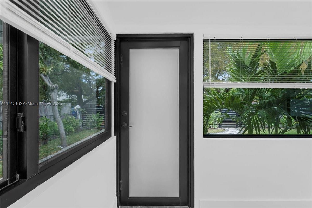 5220 Southwest 6th Street Miami, FL 33134 - Photo 18 of 56 a view of a room that has a large window