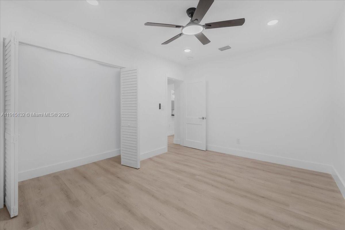 5220 Southwest 6th Street Miami, FL 33134 - Photo 31 of 56 an empty room with fan