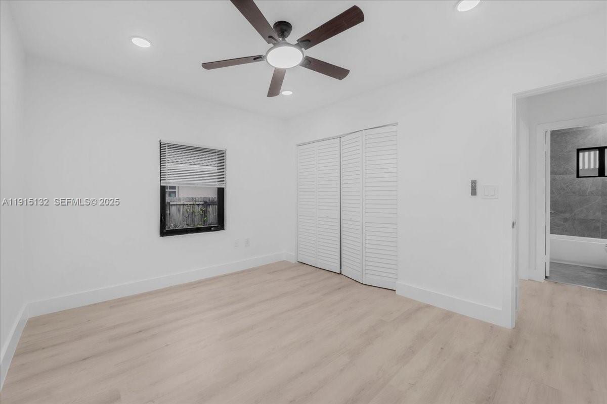 5220 Southwest 6th Street Miami, FL 33134 - Photo 32 of 56 an empty room with fan