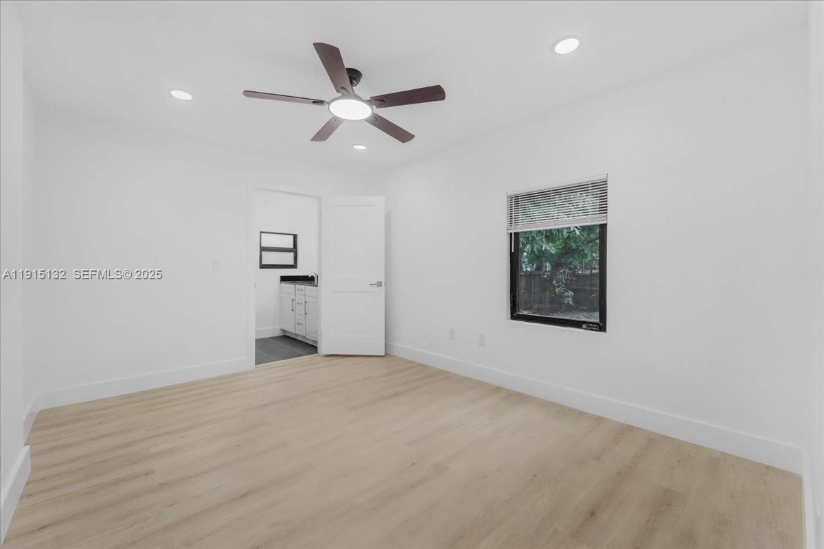 5220 Southwest 6th Street Miami, FL 33134 - Photo 35 of 56 a view of an empty room with a window