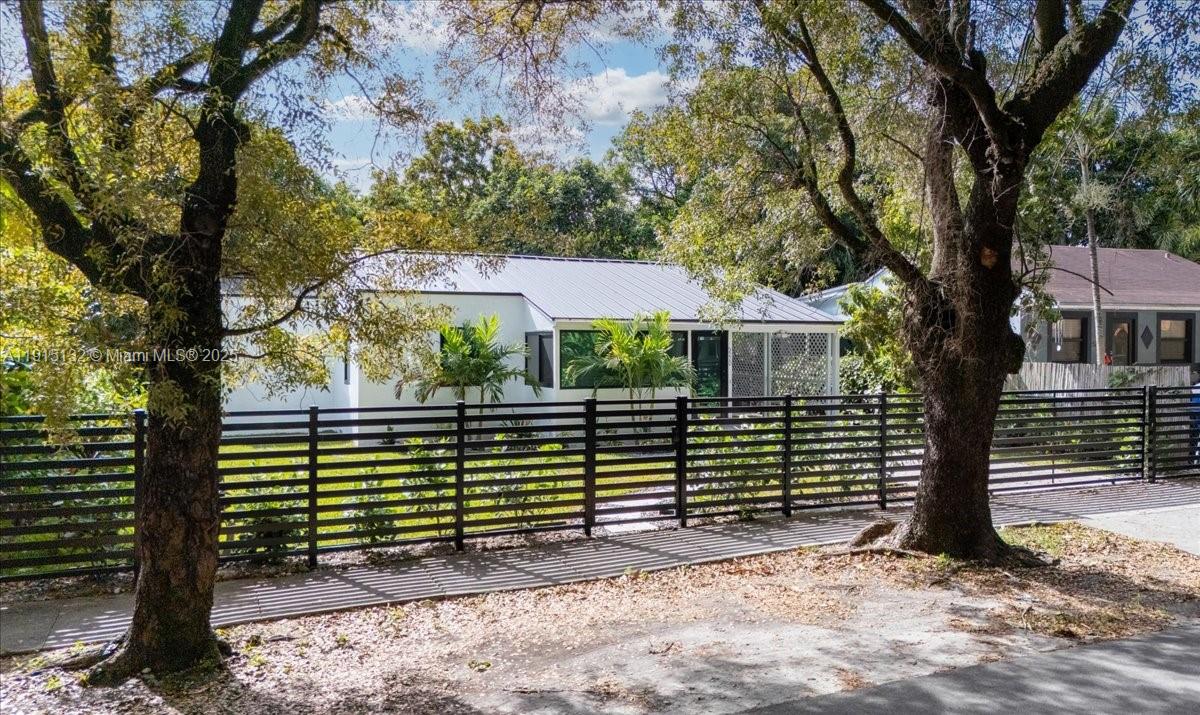 5220 Southwest 6th Street Miami, FL 33134 - Photo 4 of 56 a view of a house with a yard