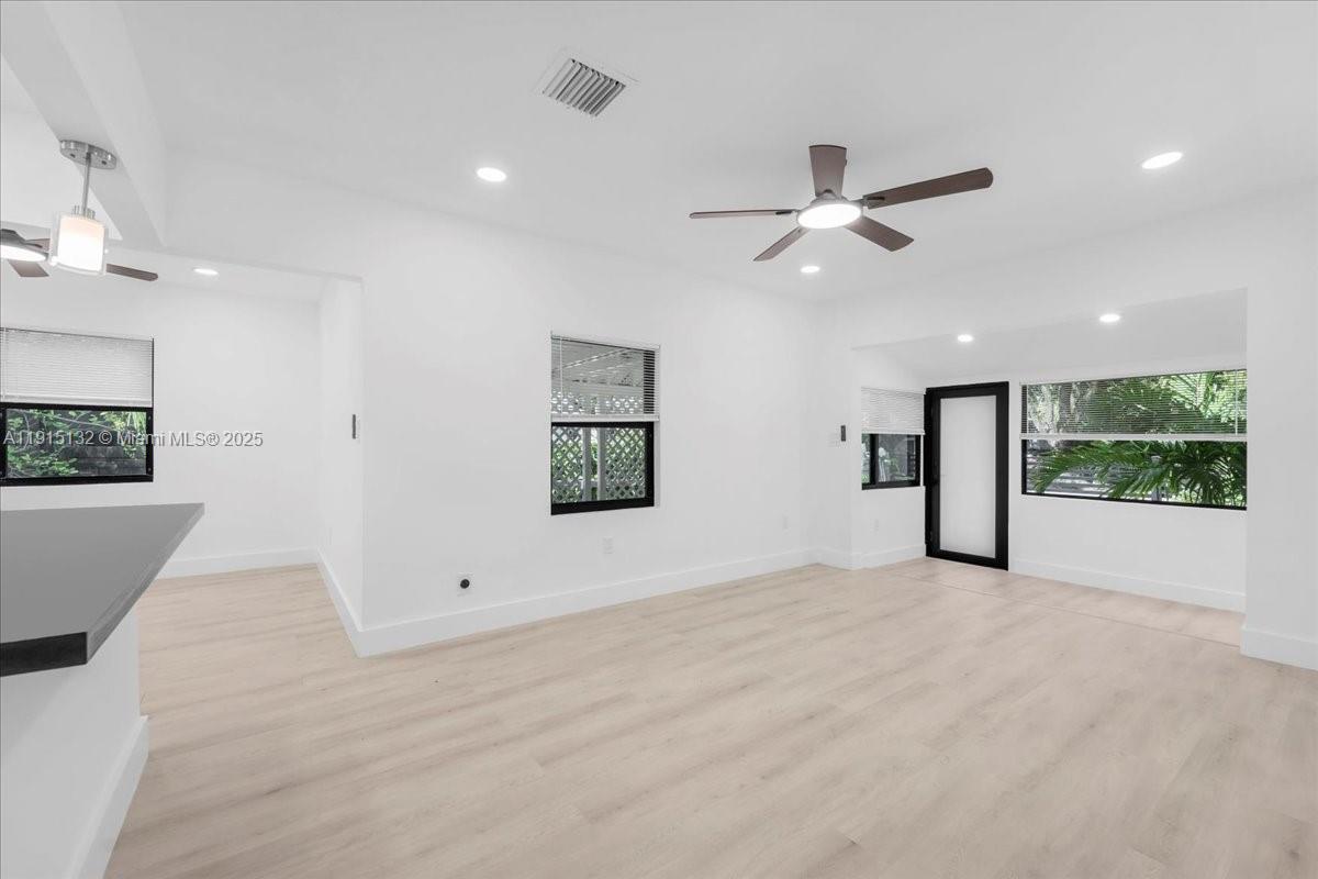5220 Southwest 6th Street Miami, FL 33134 - Photo 43 of 56 an empty room with fan and windows