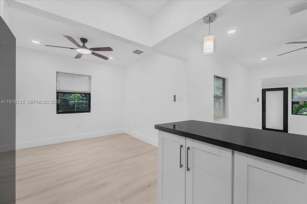 5220 Southwest 6th Street Miami, FL 33134 - Photo 46 of 56 a kitchen with a sink and cabinets