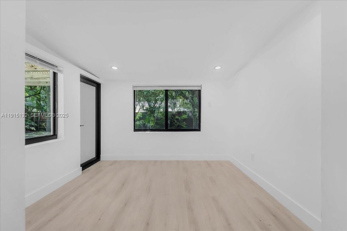 5220 Southwest 6th Street Miami, FL 33134 - Photo 53 of 56 a view of an empty room with a window