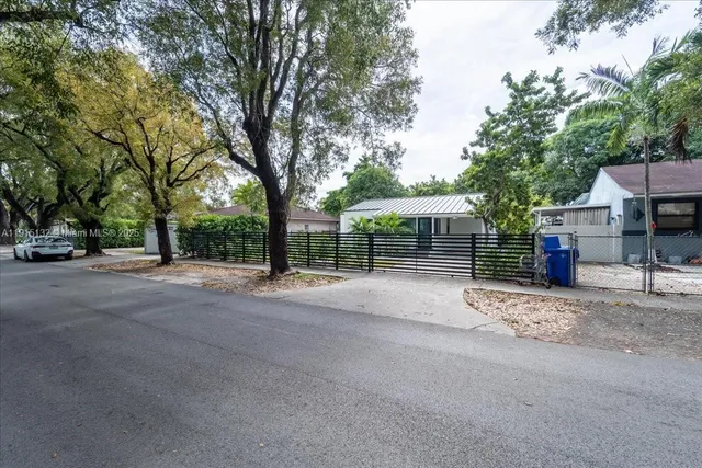 a view of street with a houses