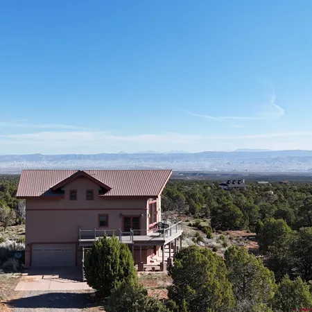 an aerial view of house with outdoor space
