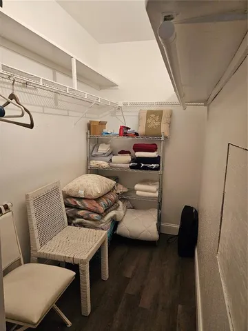 a bathroom with a sink a mirror and a shower