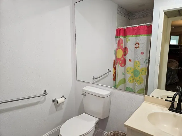 a bathroom with a sink and a toilet
