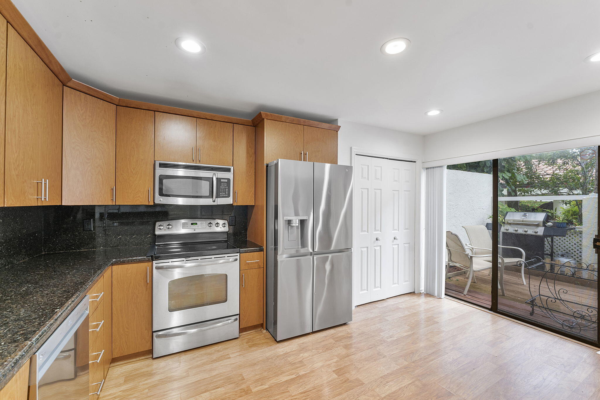 7932 Seville Place, Unit 2101 Boca Raton, FL 33433 - Photo 14 of 45 Kitchen Connected to the Porch