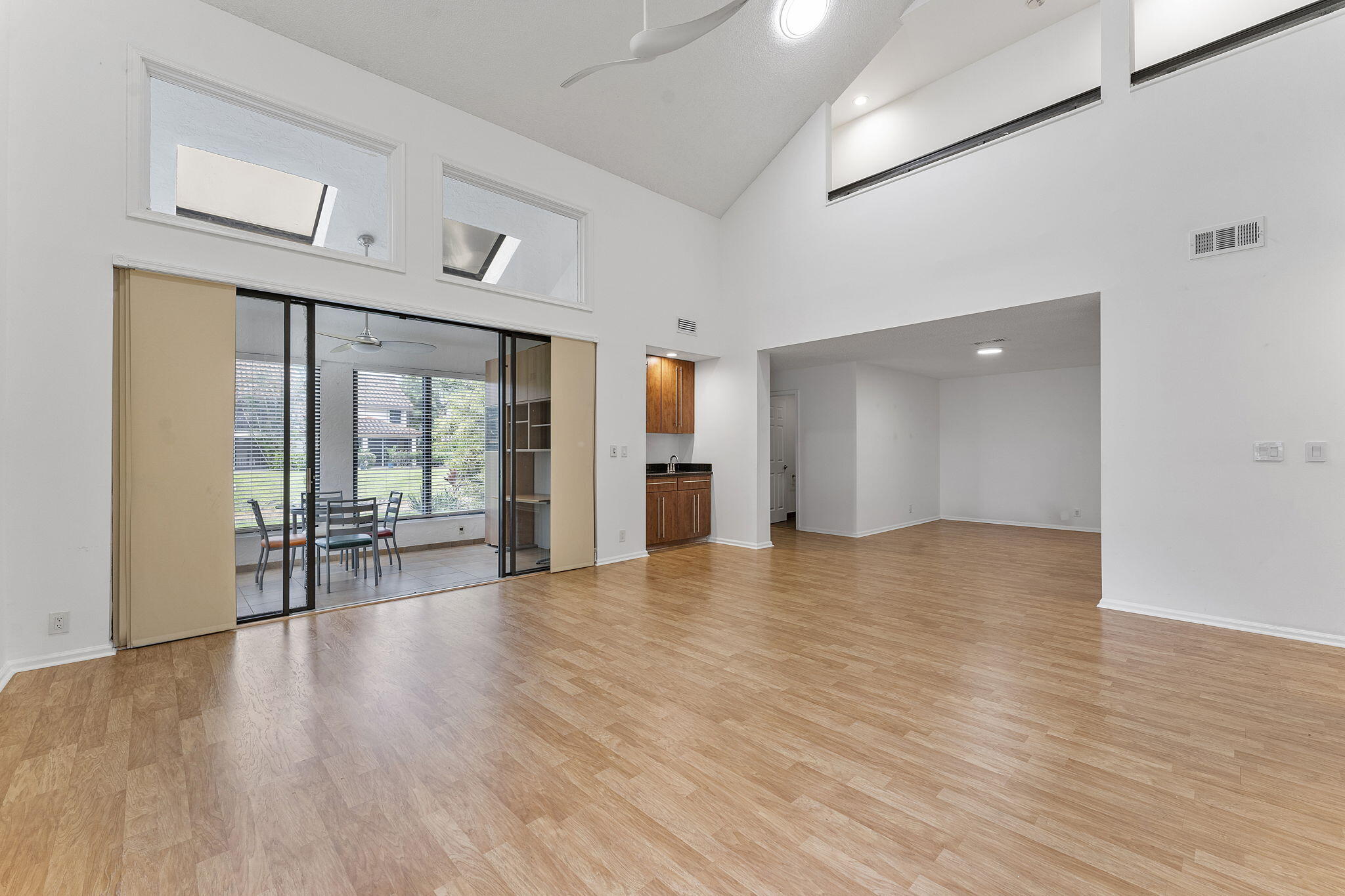 7932 Seville Place, Unit 2101 Boca Raton, FL 33433 - Photo 8 of 45 Living to Dining room