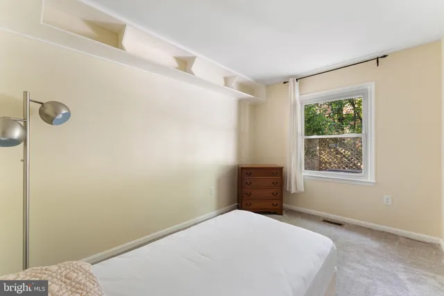 a front view of building with yard