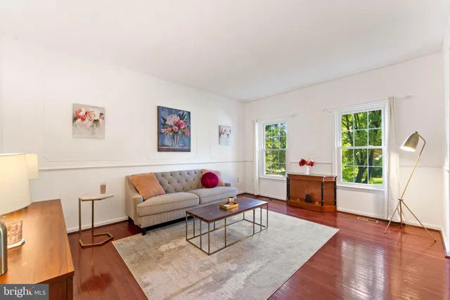a kitchen with stainless steel appliances granite countertop a stove and a microwave