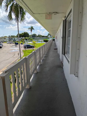 a view of a balcony with an outdoor space