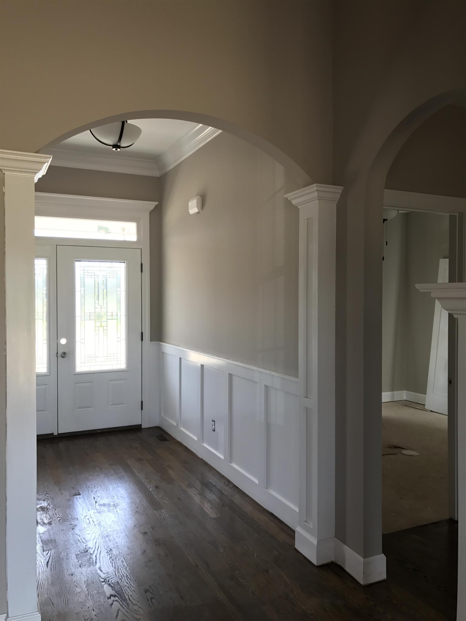 479 Halltown Road Portland, TN 37148 - Photo 13 of 25 an empty room with wooden floor and windows
