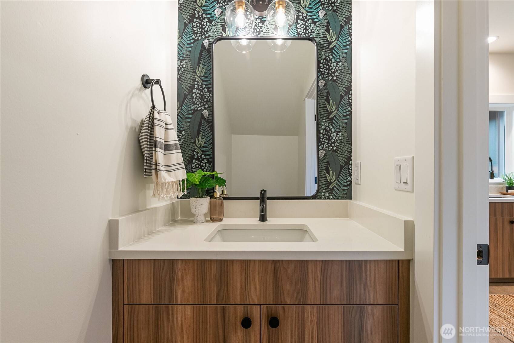 4237 Ambrosia Lane Bellingham, WA 98226 - Photo 19 of 32 a bathroom with a sink and a mirror