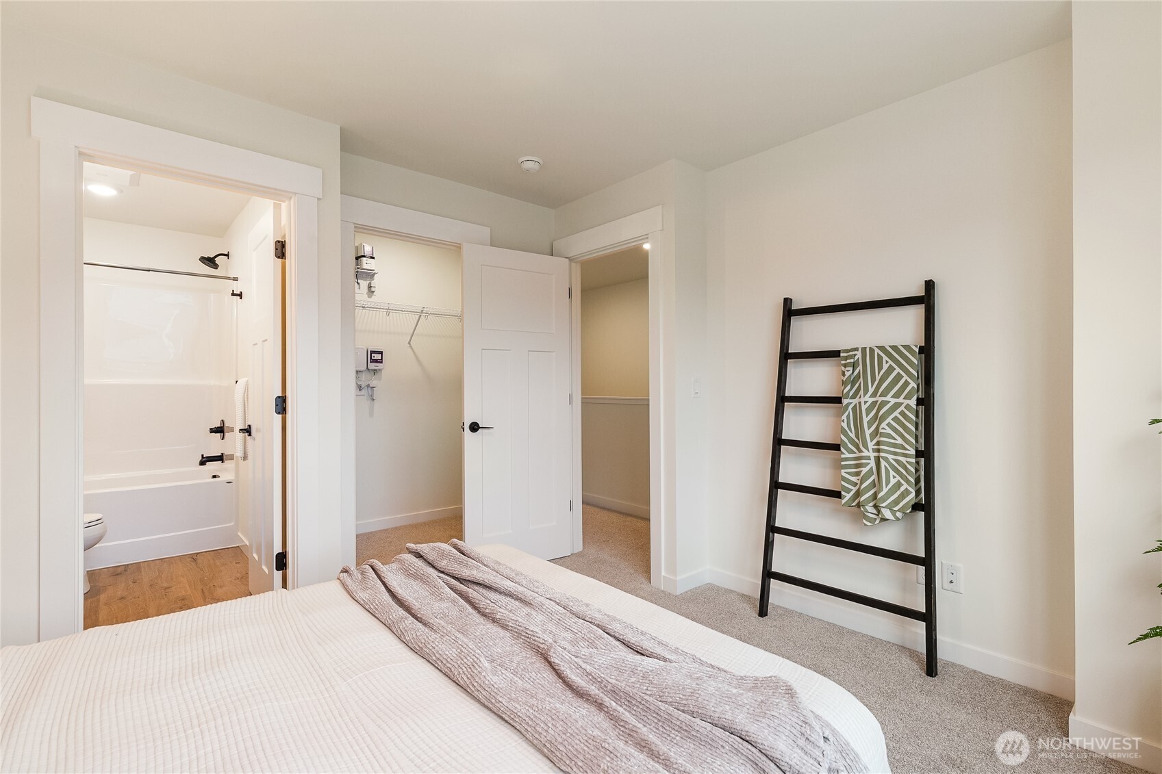 4237 Ambrosia Lane Bellingham, WA 98226 - Photo 21 of 32 a bedroom with a bed and a bathroom