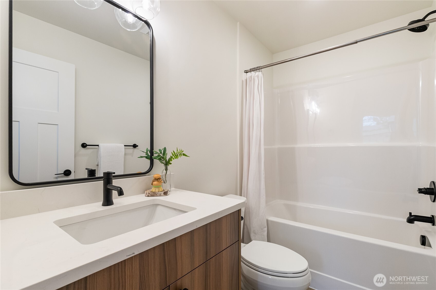 4237 Ambrosia Lane Bellingham, WA 98226 - Photo 23 of 32 a bathroom with a sink a toilet and shower