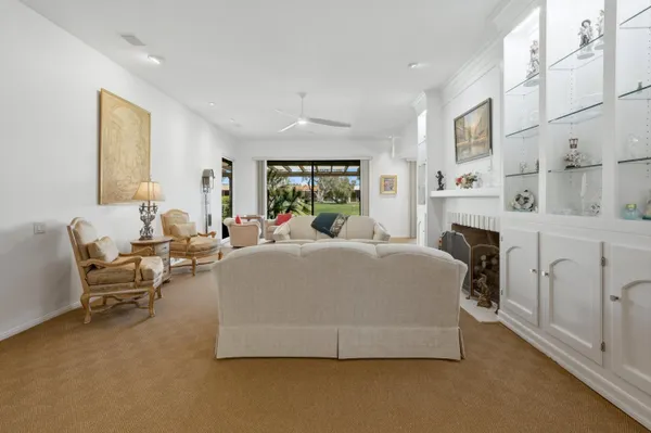 a bed room with a bed and a chair