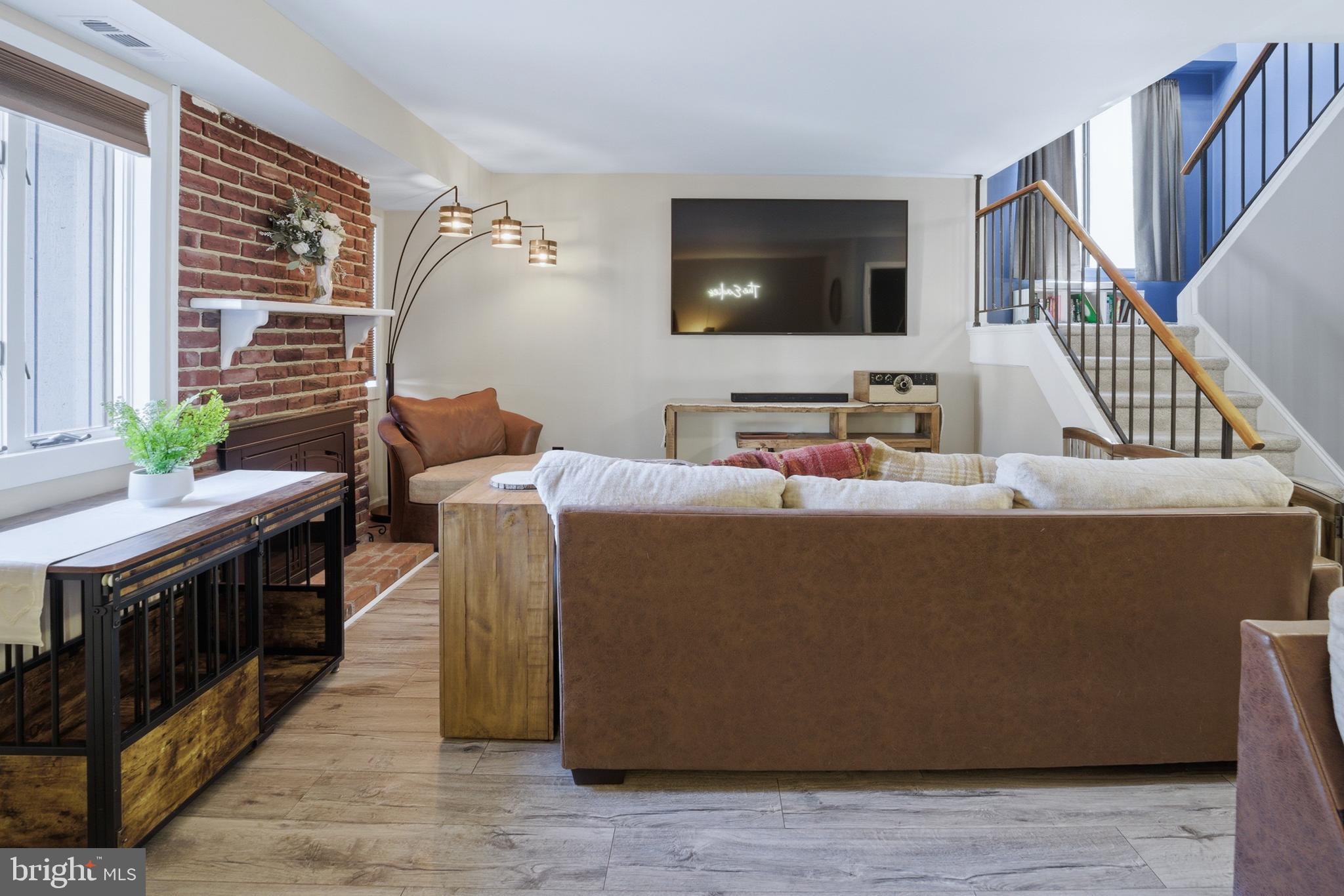 51 Harwood Lane, Unit BB Clementon, NJ 08021 - Photo 2 of 30 a living room with furniture and a flat screen tv