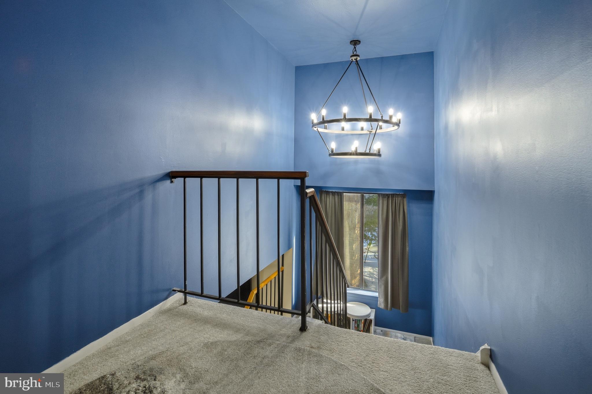51 Harwood Lane, Unit BB Clementon, NJ 08021 - Photo 22 of 30 a view of a room with staircase and mirror