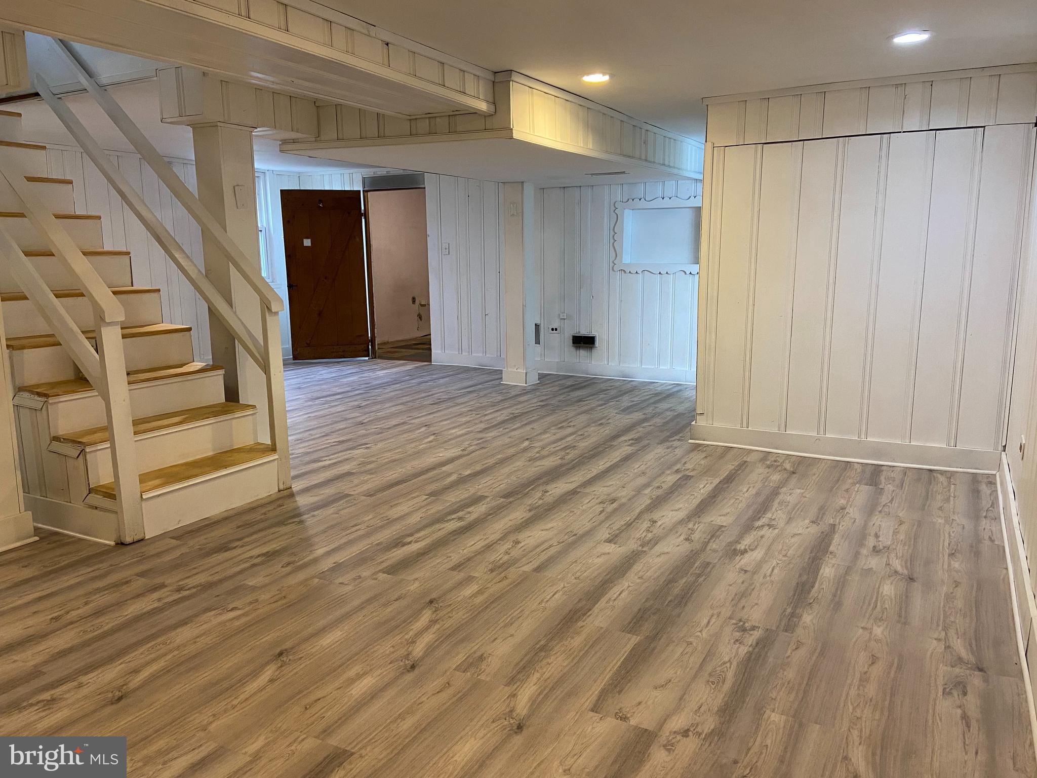 9103 Wallace Road Lanham, MD 20706 - Photo 19 of 30 a view of wooden floor and entryway in a room