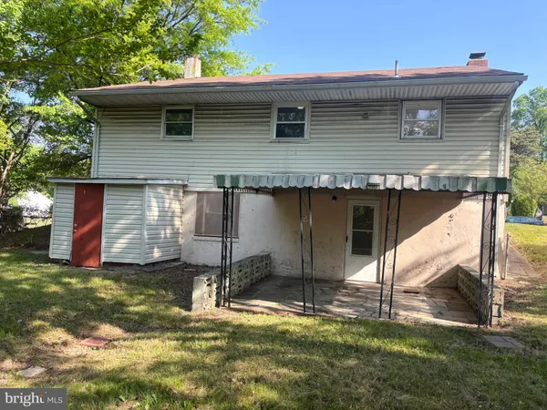 a house with yard in front of it
