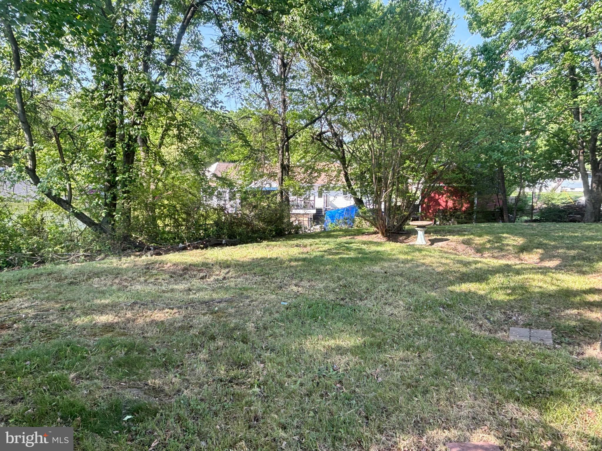 9103 Wallace Road Lanham, MD 20706 - Photo 29 of 30 a view of outdoor space with trees all around