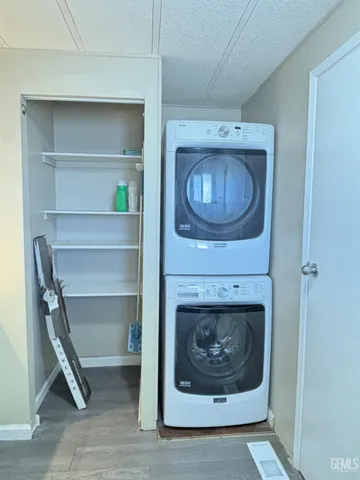 a living room with a fireplace and a stove top oven