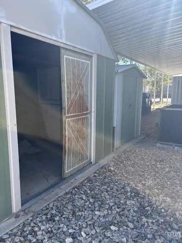 a view of a backyard of the house