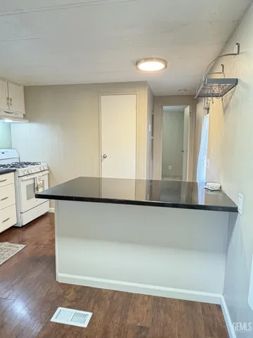 a bathroom with a bathtub and a window