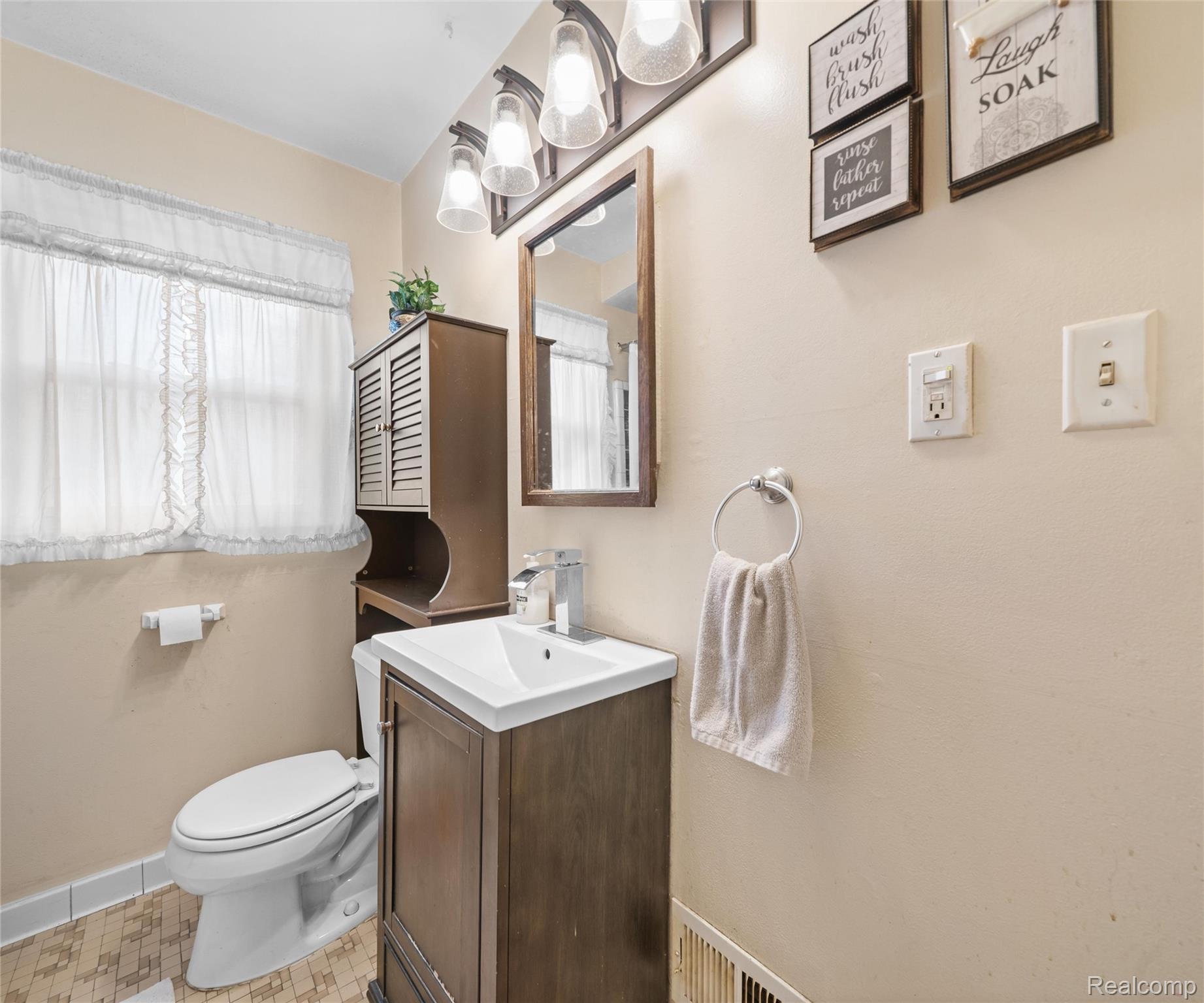 28940 Grandview Street Inkster, MI 48141 - Photo 9 of 41 Bathroom with vanity and toilet