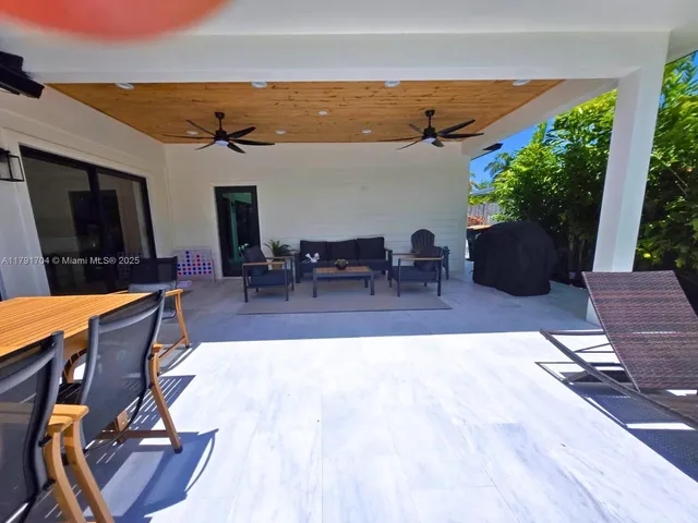 a view of outdoor space with seating area