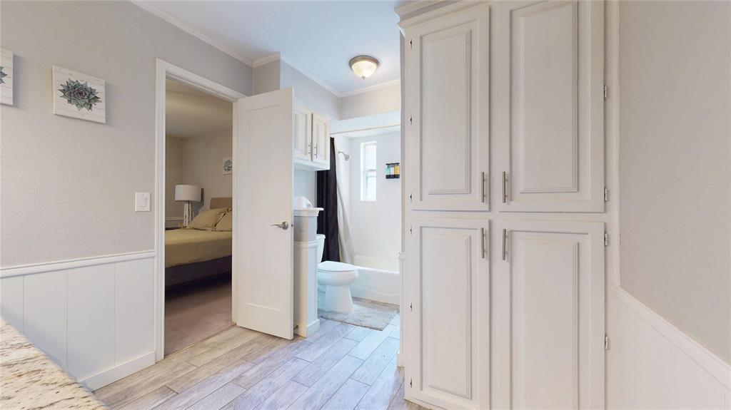 411 Sycamore Creek Road Allen, TX 75002 - Photo 25 of 36 a view of a hallway with wooden floor and entryway