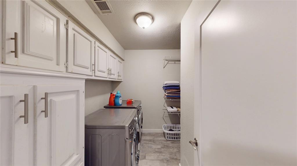 411 Sycamore Creek Road Allen, TX 75002 - Photo 29 of 36 a view of storage and utility room