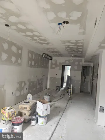 a view of a room with gym equipment and window