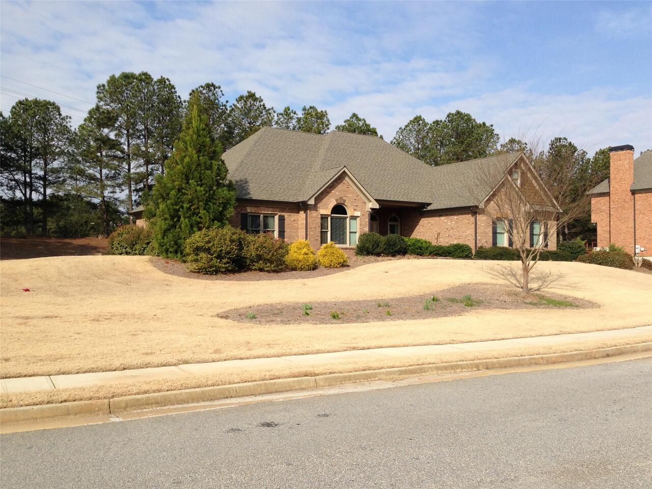 2100 Seths Ridge, Unit 1 Loganville, GA 30052 - Photo 1 of 1 a view of a house with a snow on the road