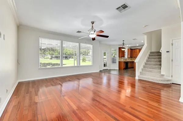 a view of a livingroom with wooden floor