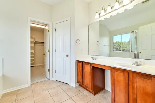 a bathroom with a bath tub and a shower