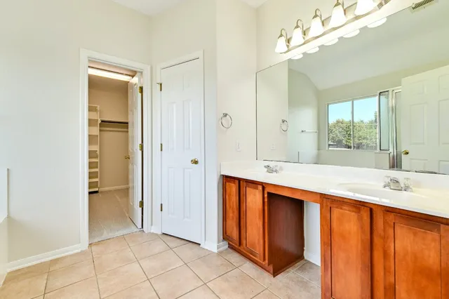 a bathroom with a bath tub and a shower