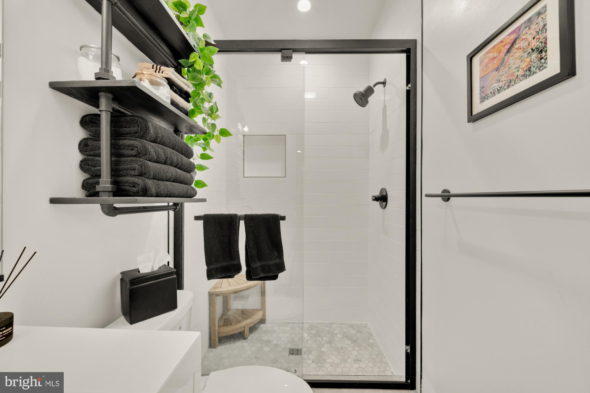 4816 3rd Street Northwest, Unit 2 Washington, DC 20011 - Photo 21 of 35 a bathroom with a toilet and a shower