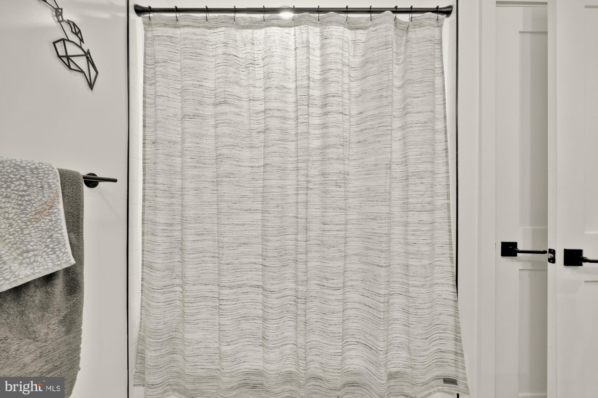 4816 3rd Street Northwest, Unit 2 Washington, DC 20011 - Photo 33 of 35 a bathroom with a shower